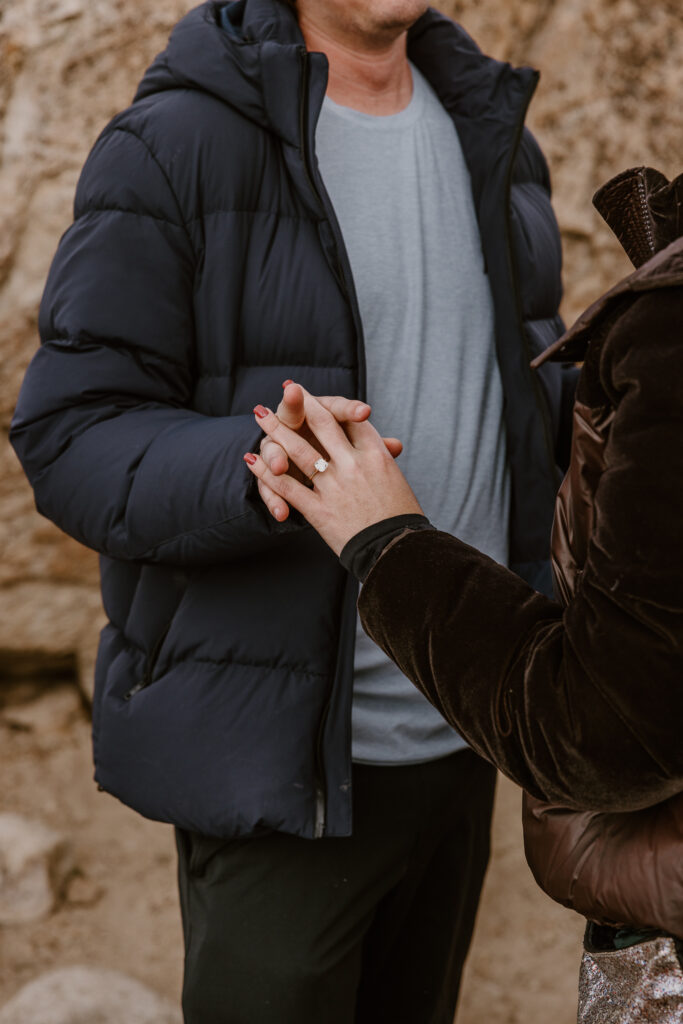 Surprise engagement ring moment captured by a Big Bear surprise proposal photographer
