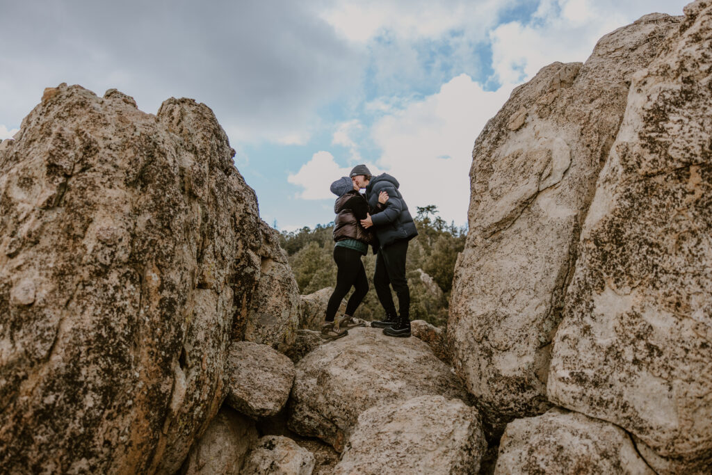 Engaged couple celebrating after a surprise proposal in Big Bear Lake